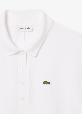 Белая женская футболка-поло Lacoste однотонная