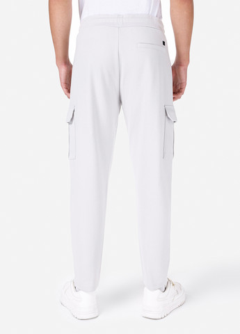 Белые спортивные демисезонные зауженные брюки Colin's