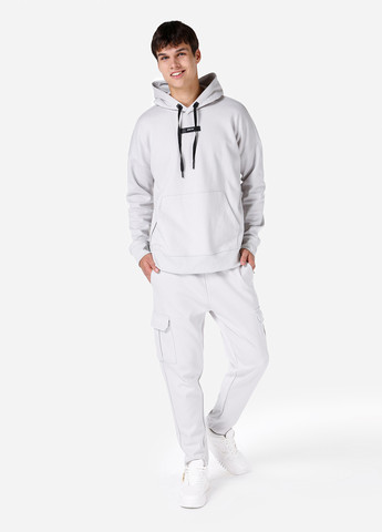 Белые спортивные демисезонные зауженные брюки Colin's