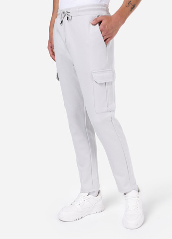 Белые спортивные демисезонные зауженные брюки Colin's