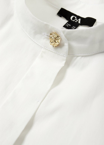 Біла блуза з баскою C&A