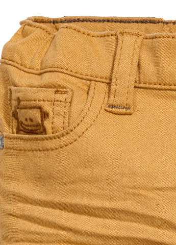 Желтые демисезонные зауженные джинсы H&M