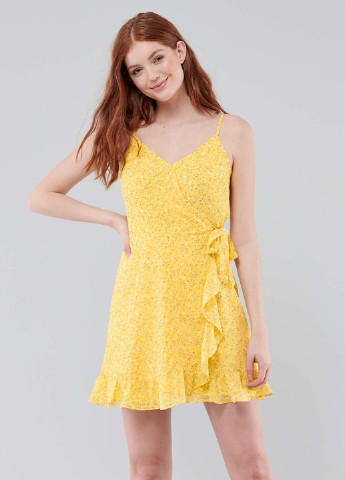 Желтое кэжуал платье на запах Hollister с цветочным принтом