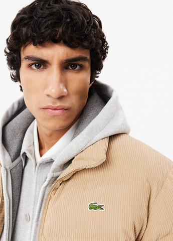 Бежева зимня куртка Lacoste