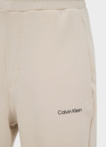 Бежевые кэжуал демисезонные джоггеры брюки Calvin Klein