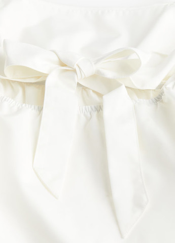 Біла блуза з баскою H&M