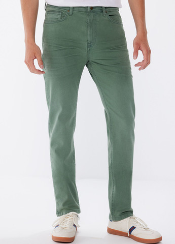 Зеленые демисезонные слим джинсы Springfield