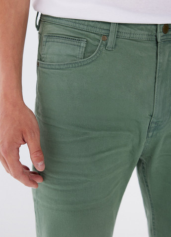 Зеленые демисезонные слим джинсы Springfield