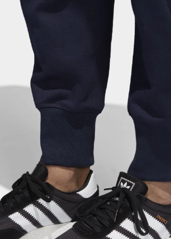 Темно-синие спортивные демисезонные зауженные брюки adidas
