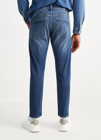 Синие демисезонные зауженные джинсы C&A