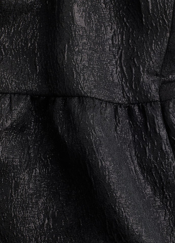 Чорна блуза з баскою H&M