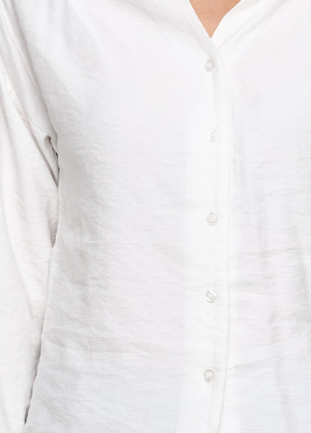 Белая блуза Vogue
