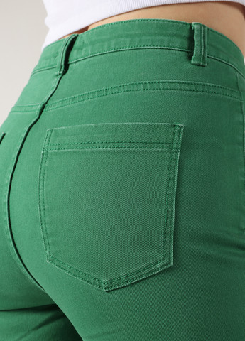 Зеленые джинсовые демисезонные клеш брюки Colin's