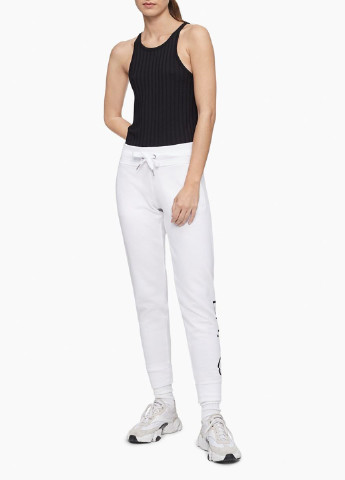 Белые спортивные демисезонные джоггеры брюки Calvin Klein