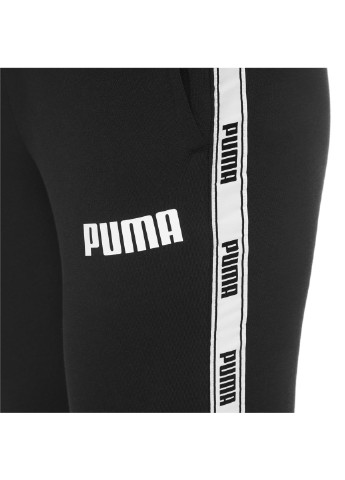 Черные демисезонные штаны tape pants tr w Puma