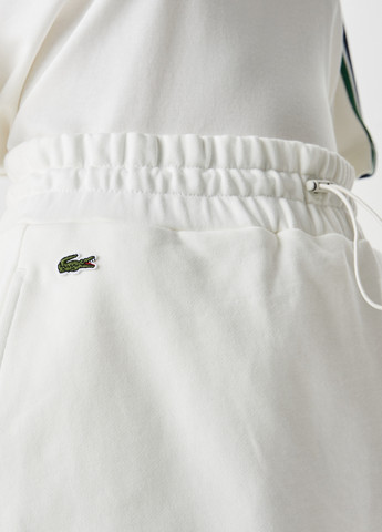 Белая кэжуал, спортивная с надписью юбка Lacoste а-силуэта (трапеция)