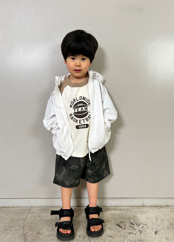 Біла демісезонна вітровка Uniqlo