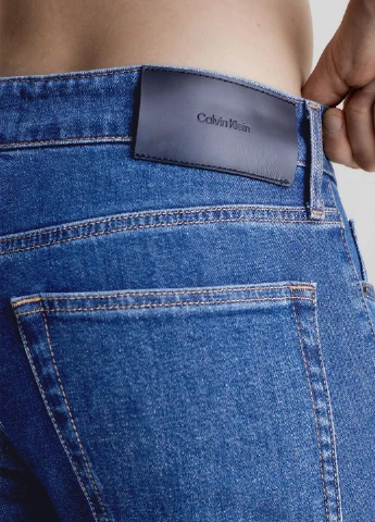 Синие демисезонные джинсы Calvin Klein