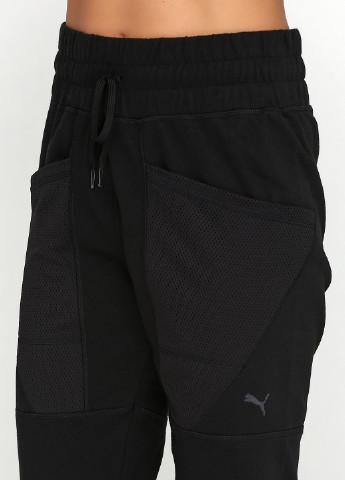 Черные спортивные демисезонные зауженные брюки Puma