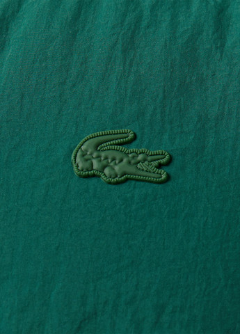 Темно-зелена демісезонна куртка Lacoste