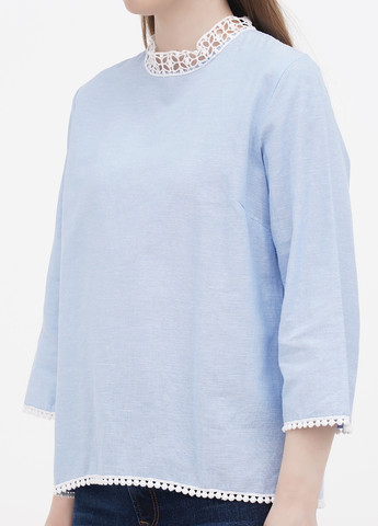Світло-блакитна демісезонна блузка Heine