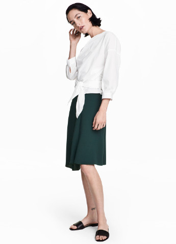 Темно-зеленая кэжуал однотонная юбка H&M клешированная, миди, со средней талией