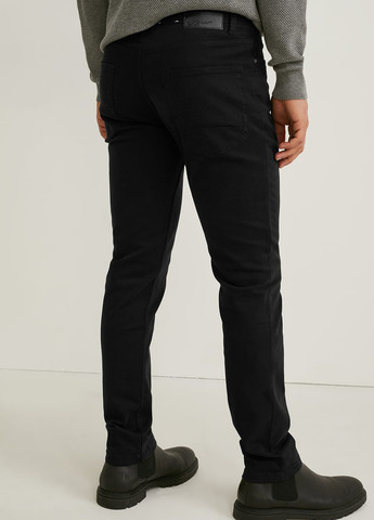 Черные демисезонные зауженные джинсы C&A