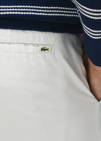 Белые кэжуал демисезонные прямые брюки Lacoste