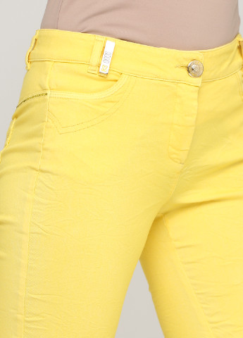 Желтые кэжуал демисезонные зауженные брюки Sassofono