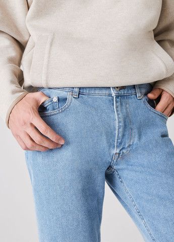 Светло-синие демисезонные регюлар фит джинсы Lacoste