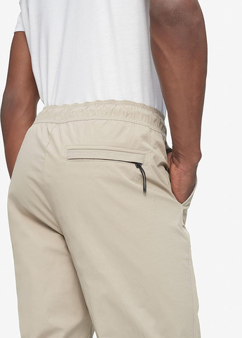 Бежевые кэжуал демисезонные джоггеры брюки Calvin Klein