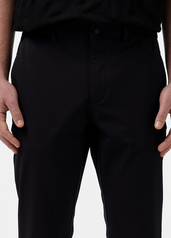 Черные кэжуал демисезонные зауженные брюки Lacoste