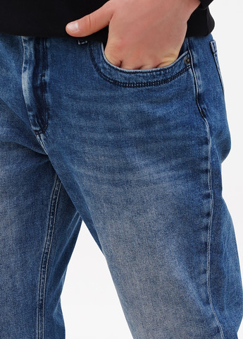 Синие демисезонные зауженные джинсы Comma