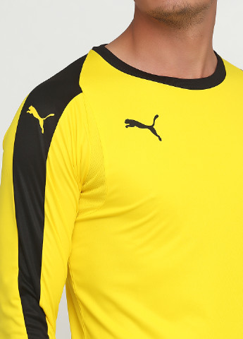Желтый демисезонный спортивный лонгслив Puma с логотипом