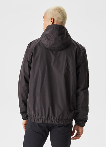 Чорна демісезонна куртка Lacoste