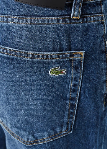 Синие демисезонные зауженные джинсы Lacoste