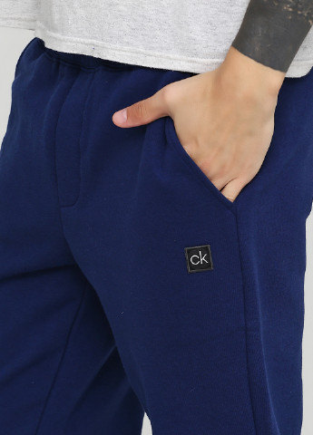 Темно-синие спортивные демисезонные джоггеры брюки Calvin Klein