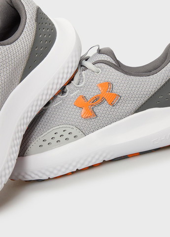 Светло-серые демисезонные кроссовки Under Armour