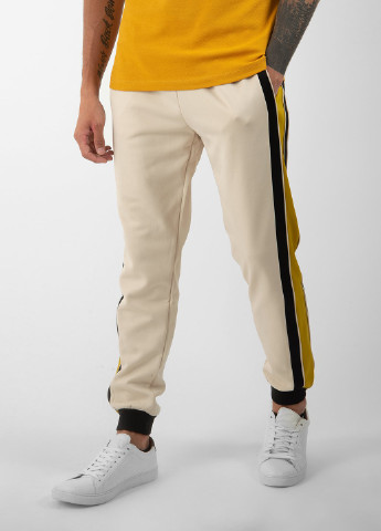 Светло-бежевые спортивные демисезонные брюки Gucci