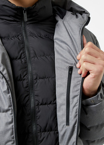 Серая зимняя куртка Lacoste