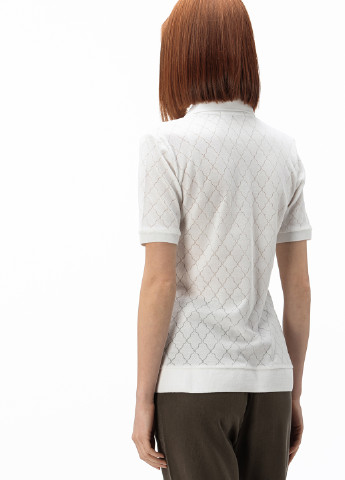 Белая женская футболка-поло Lacoste с геометрическим узором