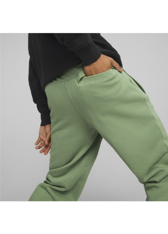 Зеленые спортивные демисезонные брюки Puma