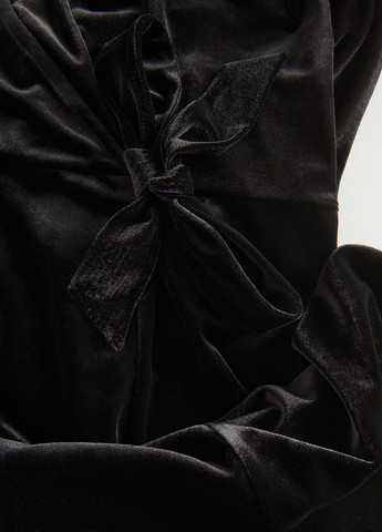 Чорна кежуал сукня на запах Reserved однотонна