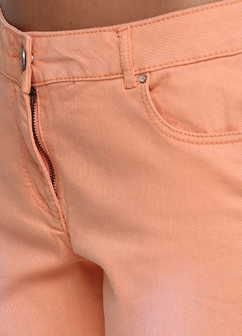 Оранжевые демисезонные зауженные джинсы Colours