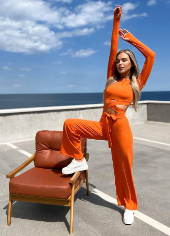 Жіночий костюм з топом та штанами палаццо помаранчевийевого кольору р.42/44 363134 New Trend (256030077)