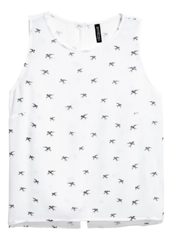 Белая с анималистичным узором блузка H&M летняя