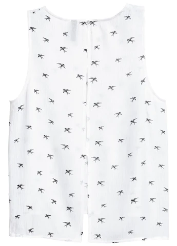 Белая с анималистичным узором блузка H&M летняя
