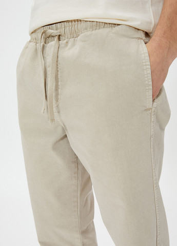 Светло-бежевые летние зауженные брюки KOTON
