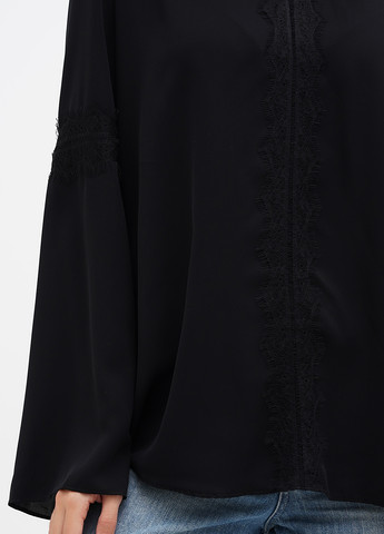 Чорна блуза Sassofono