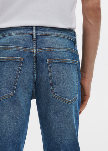 Синие демисезонные зауженные джинсы Reserved